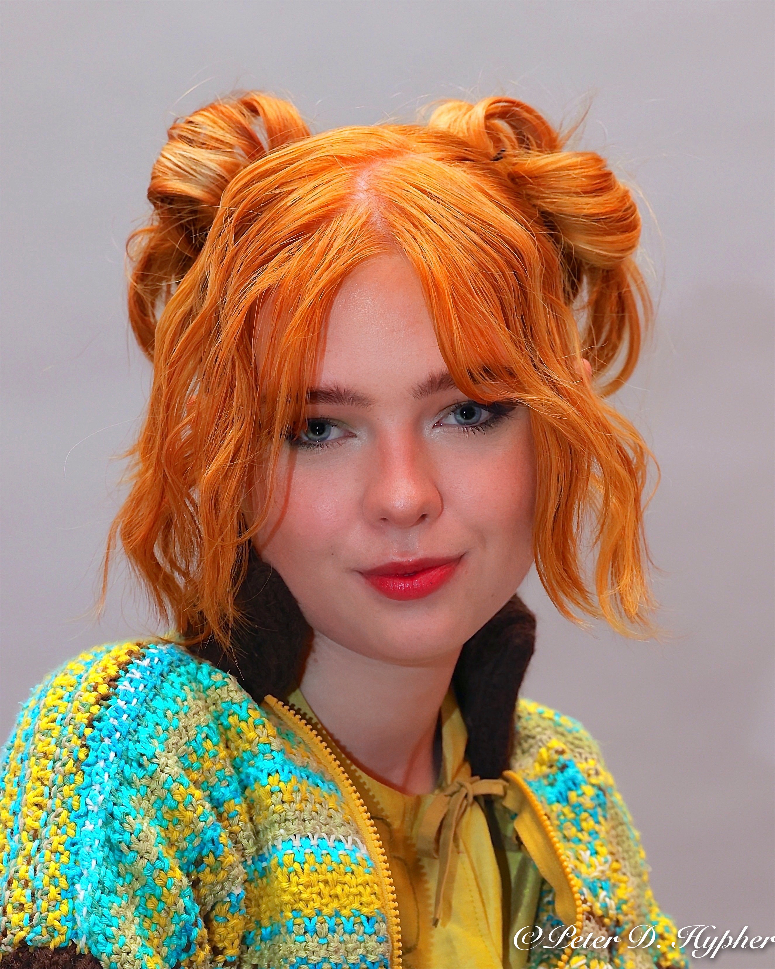 en person med rødt hår